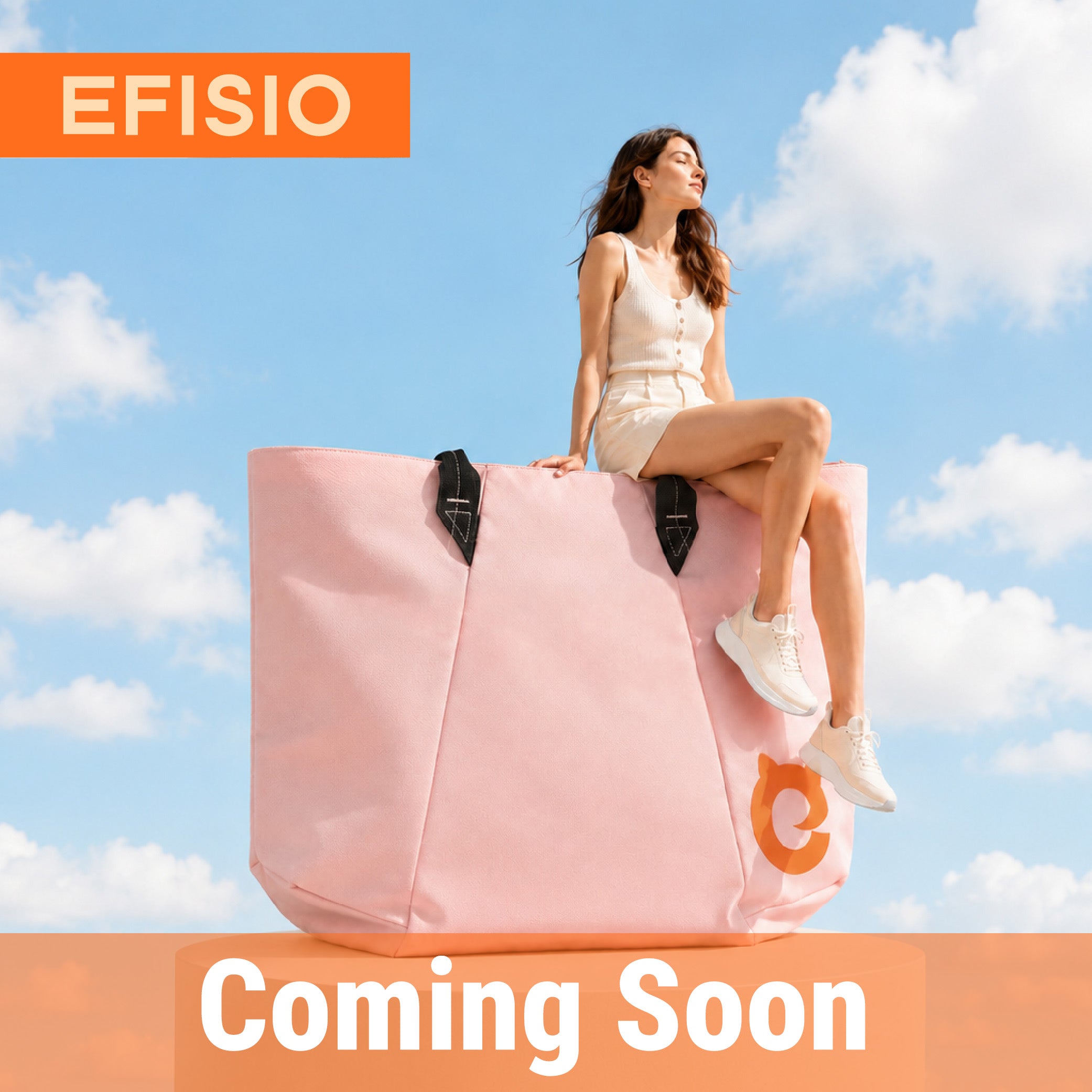 Woman sitting on a large EFISIO Avelina Tote Bag with 'EFISIO' branding against a blue sky.